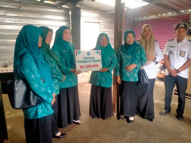 Kunjungan Kerja Ibu Ketua TP PKK Kota Madiun dan  Penyerahan bantuan sosial Perbaikan Rumah Tidak Layak Huni dalam rangka Hari Kesatuan Gerak PKK Ke 54 Tahun 2026